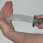 A blunt soft-plastic knife for martial arts an...